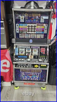 Vintage Triple Double BUTTERFLY SEVENS Slot Machine by IGT with Key. Works