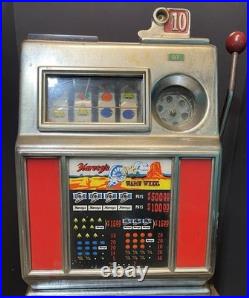 Vintage coin op slot machine, Harvey's Wagon Wheel. 10 cent. Working