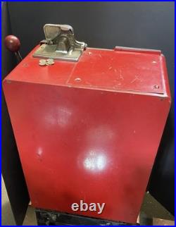 Vintage coin op slot machine, Harvey's Wagon Wheel. 10 cent. Working