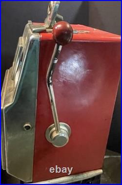 Vintage coin op slot machine, Harvey's Wagon Wheel. 10 cent. Working
