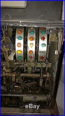 Vintage mills black cherry slot machine 5 cent