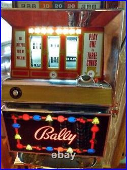 WORKING VINTAGE BALLY ELECTRO-MECHANICAL 1 CENT SLOT MACHINEWithCLAW STANDVEGAS