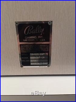 White Gold Ballys Token Slot Machine With Cabinet Stand